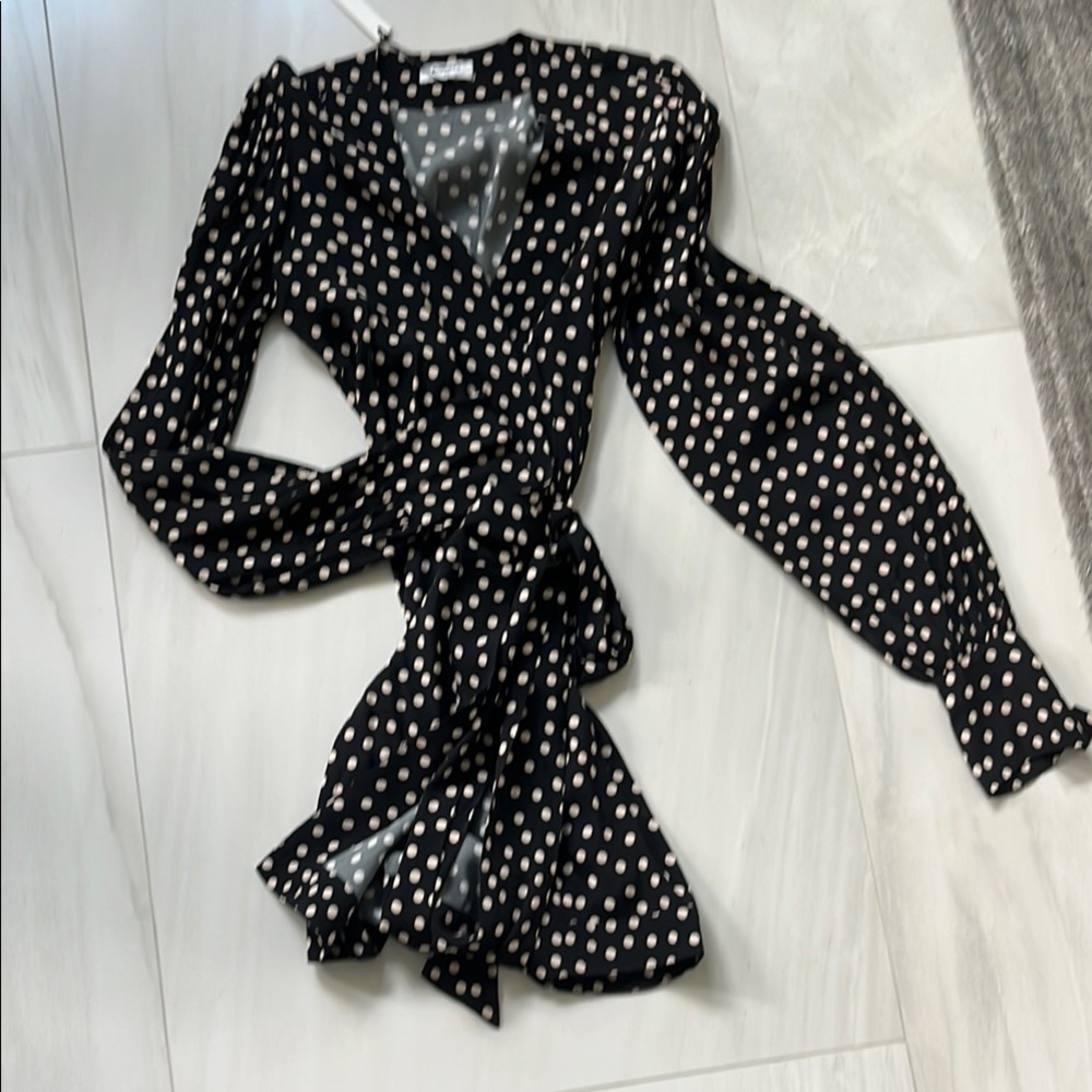 Black Polka Dot Wrap dress by Rumored mini and super cute
